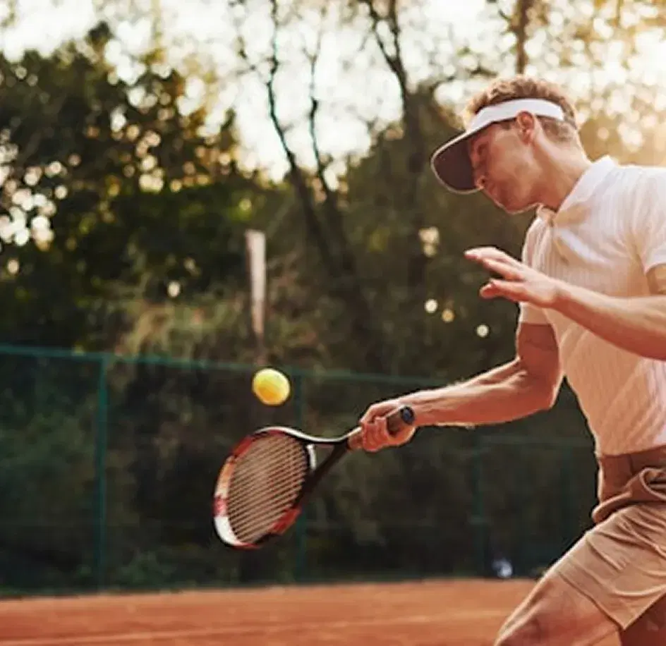 Tennis rally on a clay court